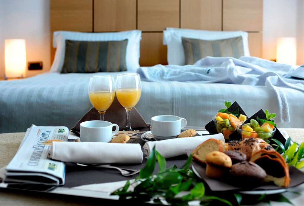 Hotel Domina Milano Fiera Novate Milanese Habitación foto
